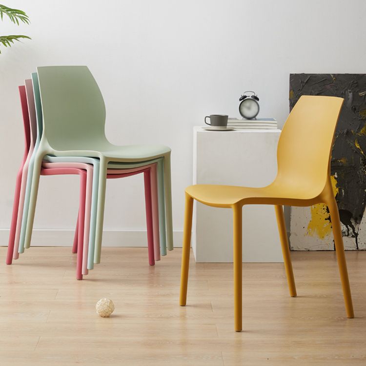 Scandinavian Armless Dining Chairs Plastic Indoor Stackable Solid Back Side Chair
