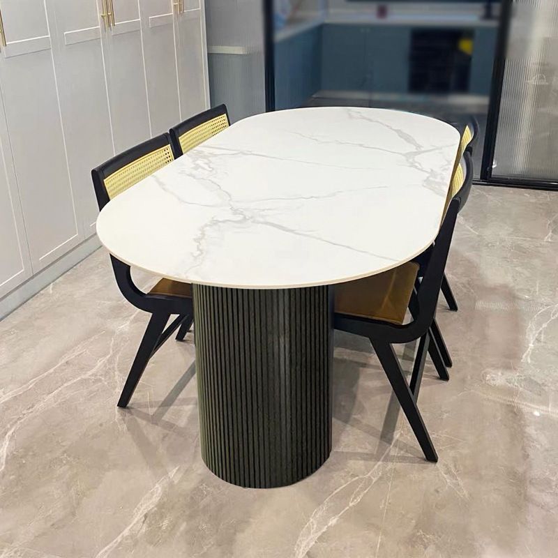 Table à manger en pierre fritrée de style moderne avec une double base de piédestal double