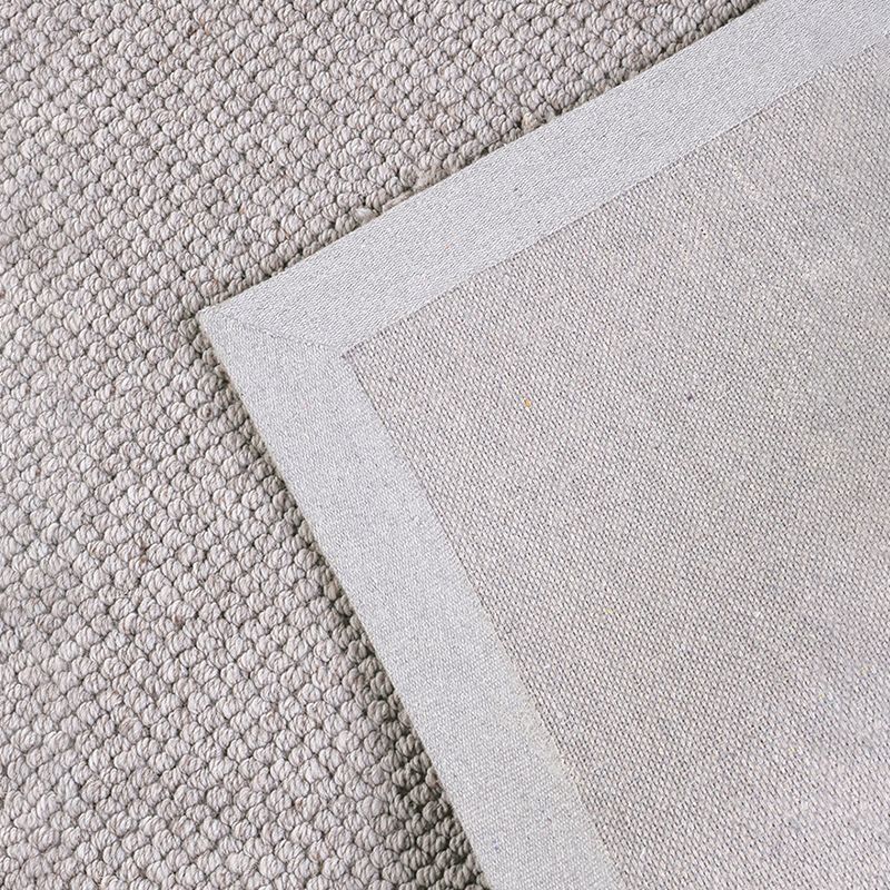 Ausgefallener grauer moderner Teppich aus einfarbigem Polyester mit rutschfester Rückseite für die Inneneinrichtung
