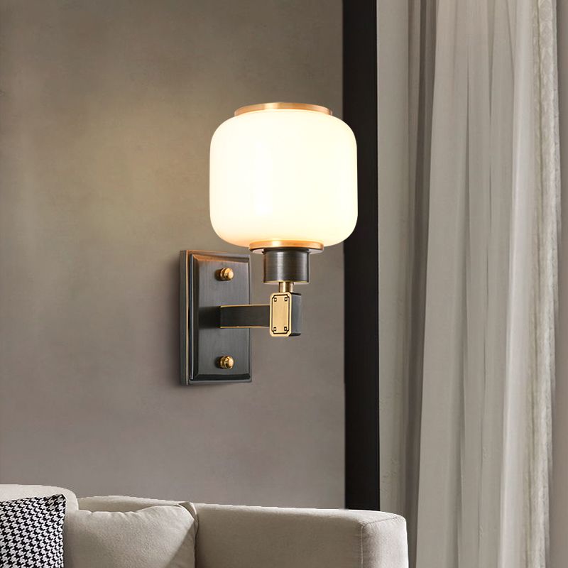 Modern Metal Wall Sconce Lantern Shape Wall Light with Glass Shade for Bedroom