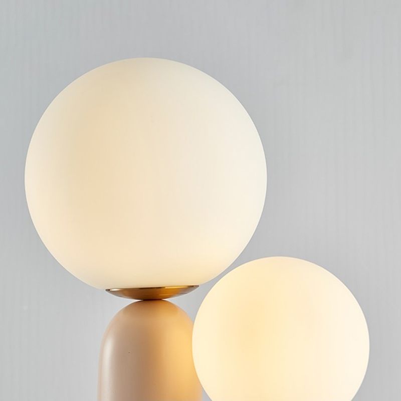 Lumière de table rose à 2 lumières dans la lampe de table en résine laquée de style créatif moderne avec nuance de verre globe