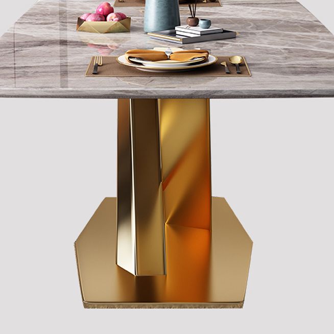 Mesa rectangular de lujo tradicional, mesa de piedra sinterizada gris con base de pedestal dorado