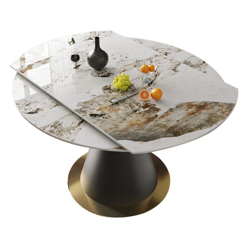 Mesa de comedor de lujo tradicional mesa de pedestal de piedra sinterizada con base de metal