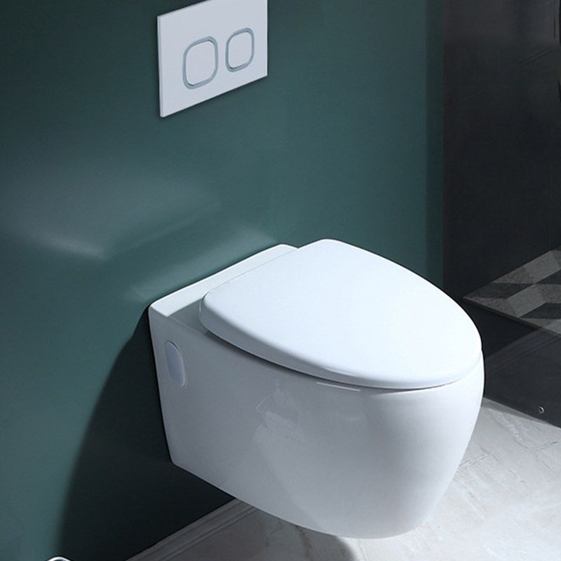 Modern Concealed Tank Toilet Skirted Ceramic Wall Hung Flush Toilet with Seat