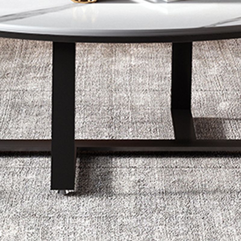 Glam Oval Top Coffee Table with Iron Cross Base and Stone Top