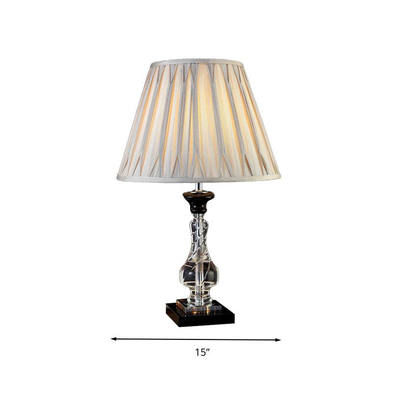 Lámpara de mesita de noche Minimalism Bell, 1 luz nocturna de tela ligera en gris crema con base de cristal translúcido