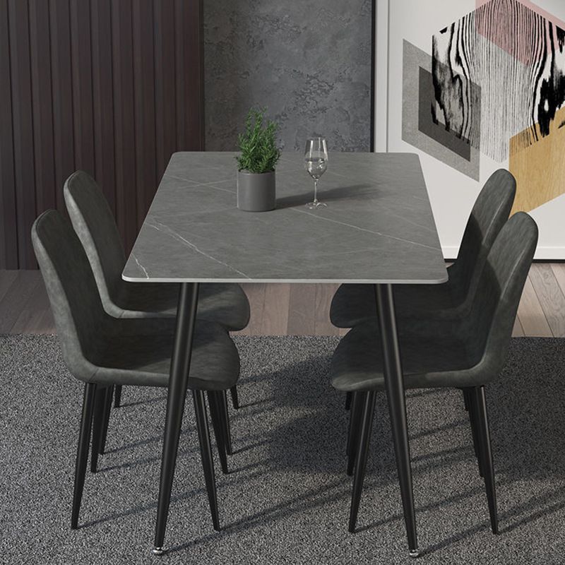 Mesa de comedor de rectángulo industrial de metal Mesa de piedra sinterizada con piernas