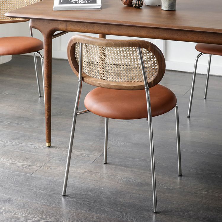 Silla sin brazos contemporánea, silla con respaldo abierto curvado de cuero con acabado mate para patio