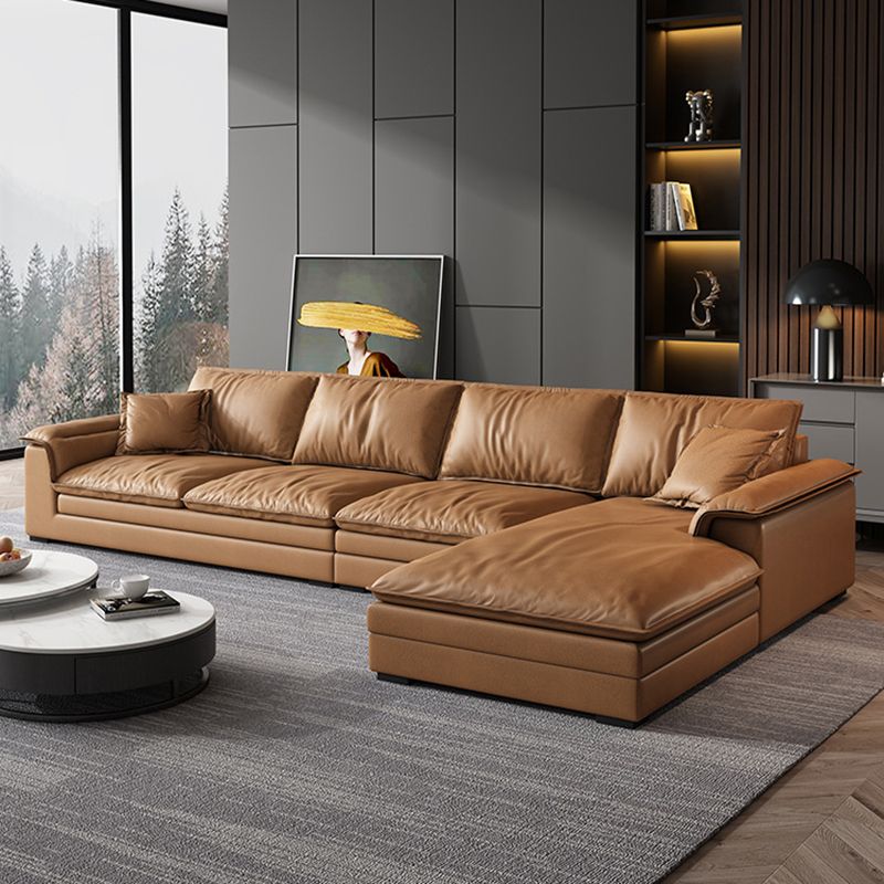 Glam Style Sofa Bed with Sponge Upholstery Filled Orange Faux Leather Sofa