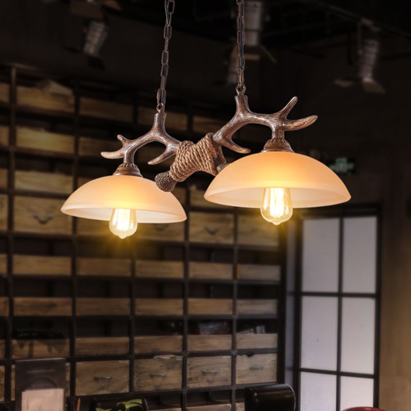 Bowl Shaped Beige Glass Island Pendant Light Rustic 2 Bulbs Restaurant Ceiling Light with Antler Decor in Brown