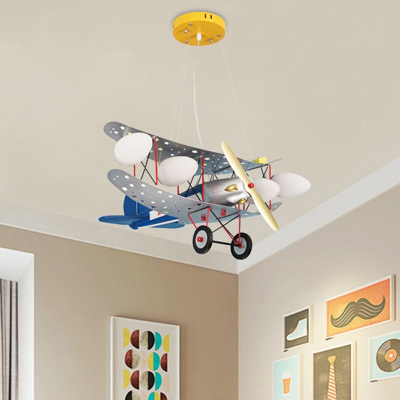 Iron Fighter Aircraft Hanging Light Kid 4-Bulb Blue Chandelier Lamp with Oval Ivory Glass Shade