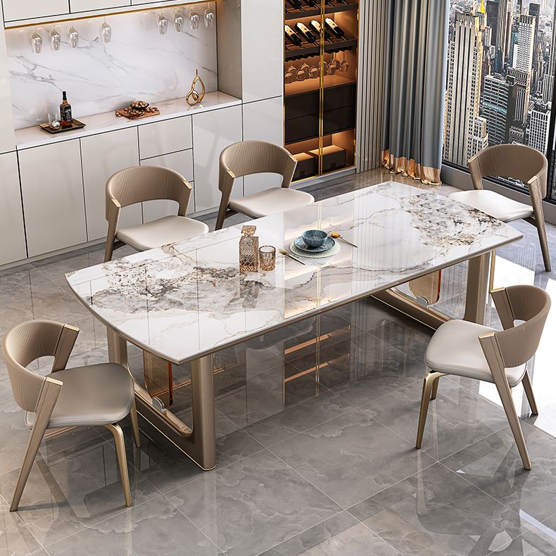Mesa de comedor de lujo con tapa de piedra sinterizada, mesa rectangular con pedestal doble dorado