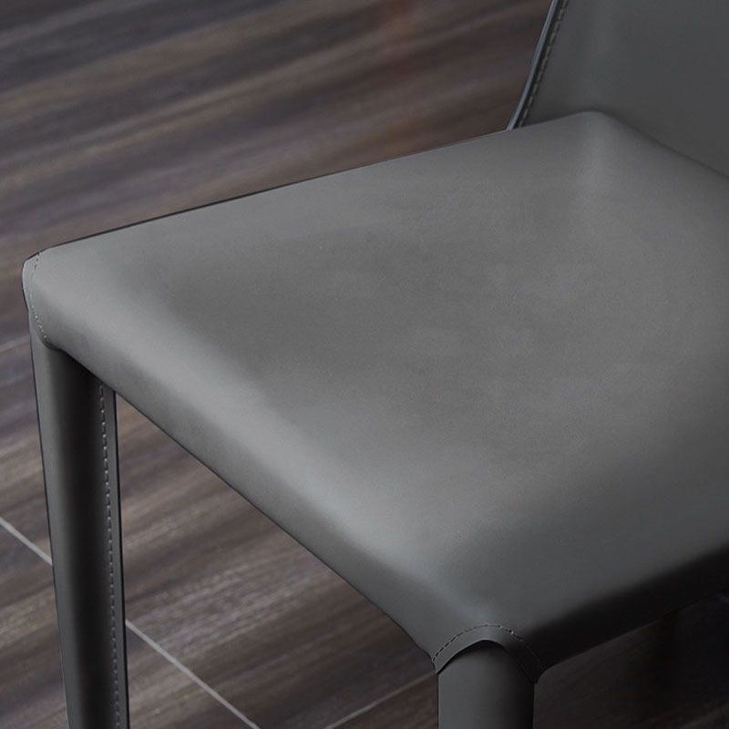 Eigentijdse massieve rugarmloze zijstoelen lederen eetkamerstoelen voor keuken