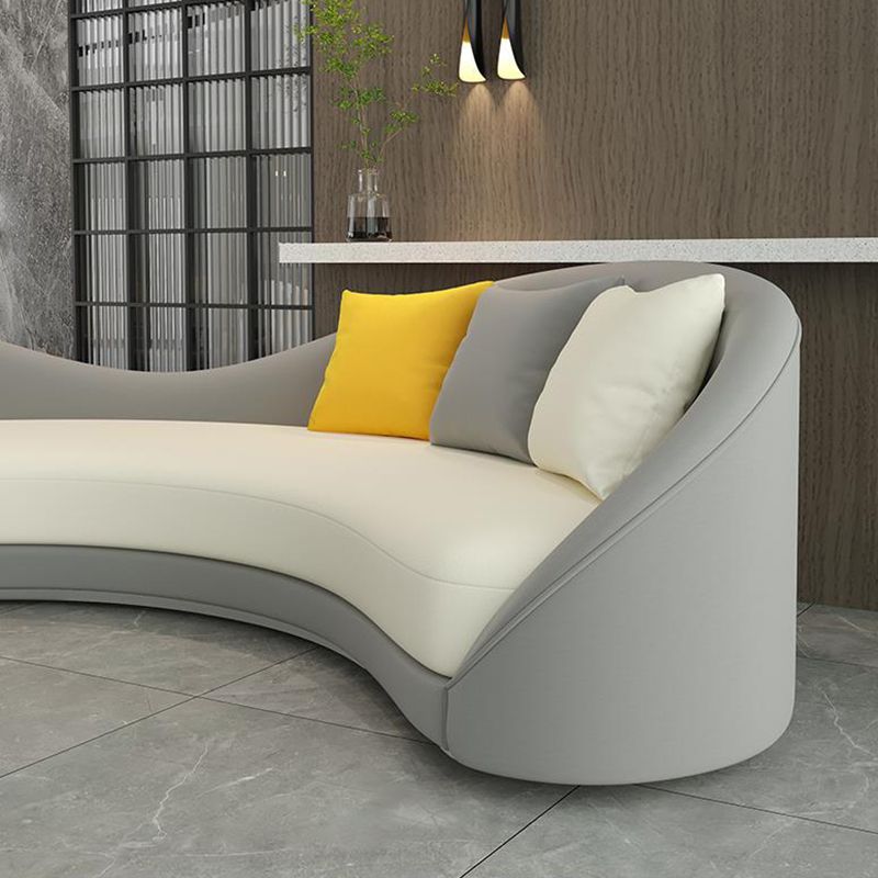 Contemporary Sloped Arm Curved Sofa Faux Leather Camel Back Sofa