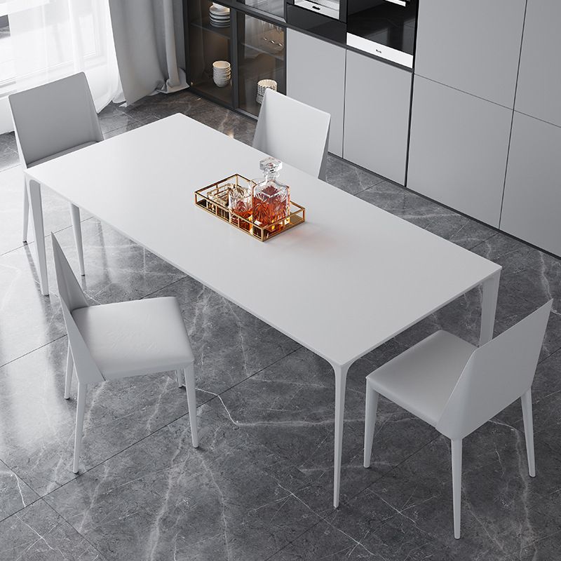 Table rectangulaire contemporaine en métal blanc table à manger en pierre fritrée avec 4 jambes