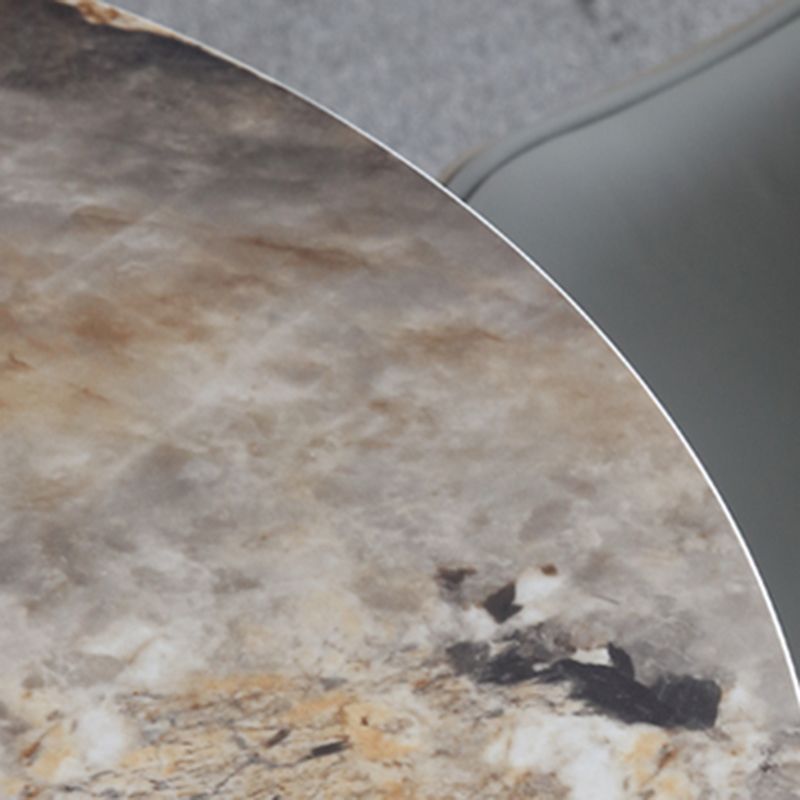 Ronde eigentijdse eettafel in bruintinten Vaste tafel van gesinterde steen