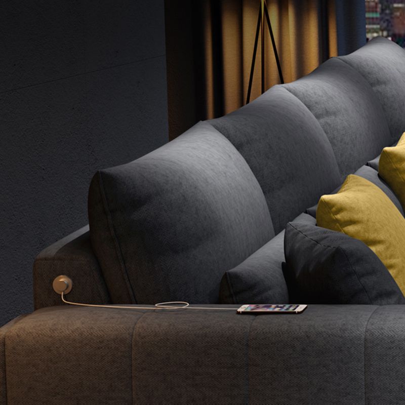 Dark Gray Contemporary Sectional with Recessed Arm and Pillowed Back Cushions