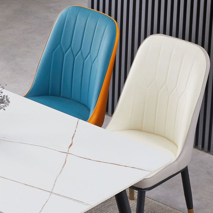 El comedor atractivo del metal del estilo preside la silla de cuero sin brazos de Parsons para el restaurante