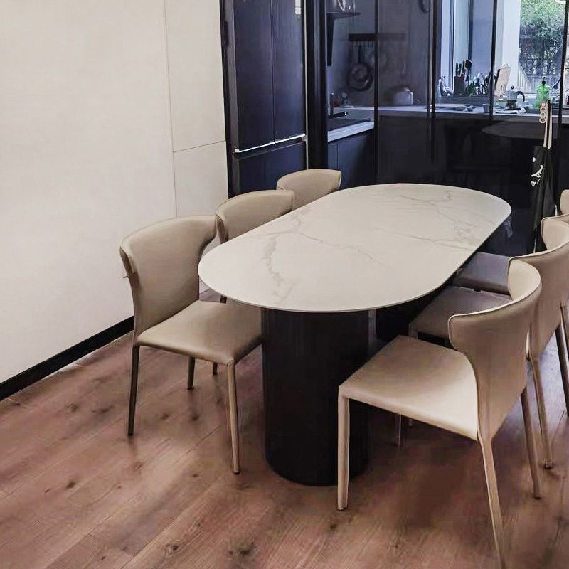 Table à manger en pierre fritrée de style moderne avec une double base de piédestal double