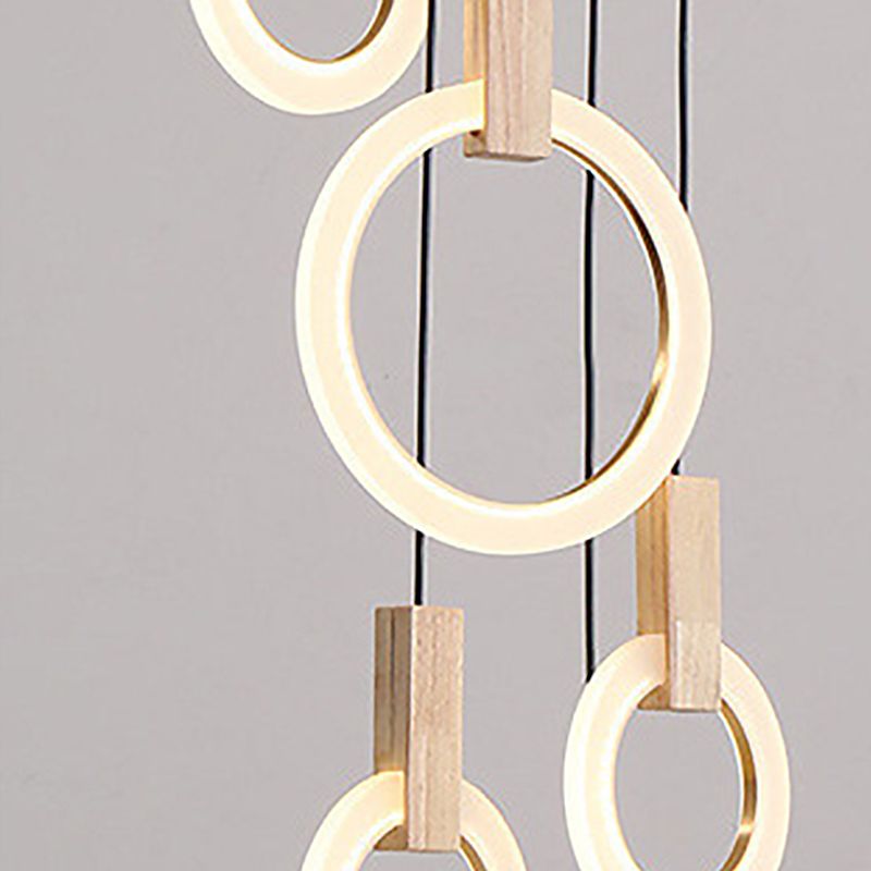 Enclaceur de cercles en bois massif pendentif