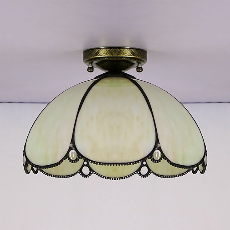 Vetro colorato a filo smerlato