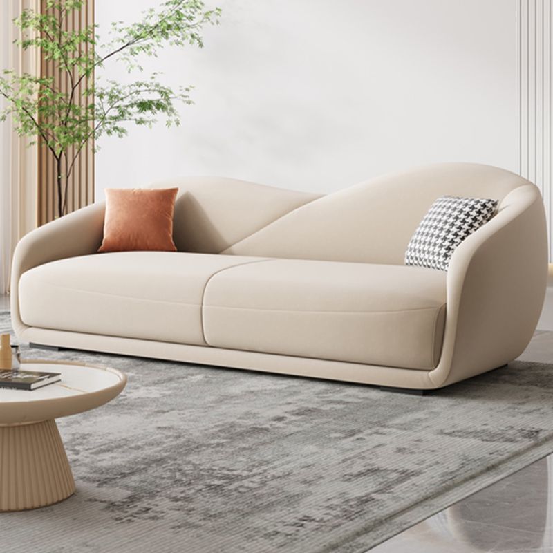 Contemporary Sloped Arm Curved Sofa Sewn Pillow Back Sofa for Living Room