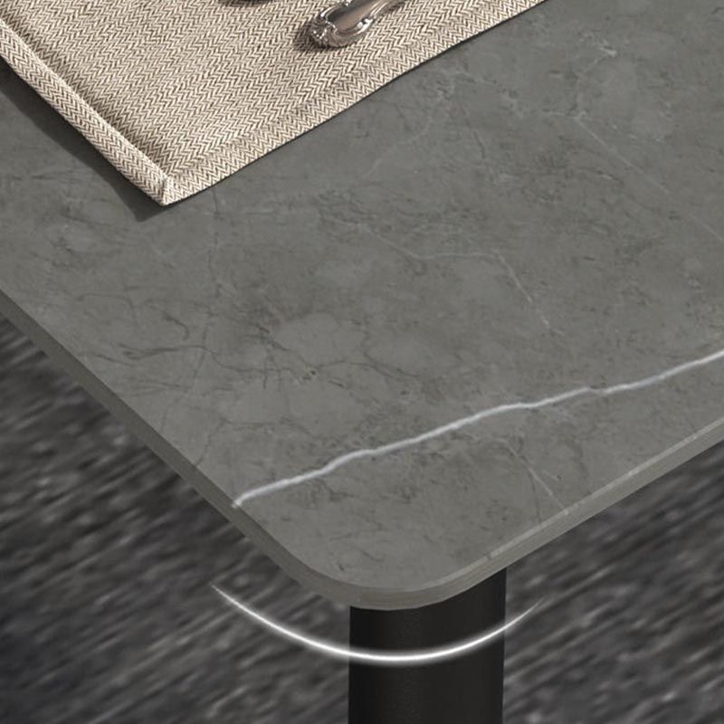 Mesa de comedor de rectángulo industrial de metal Mesa de piedra sinterizada con piernas