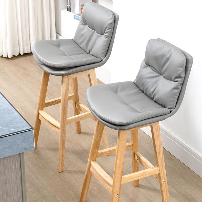 Taburete de bar de cuero con respaldo bajo, moderno taburete de interior con patas de madera