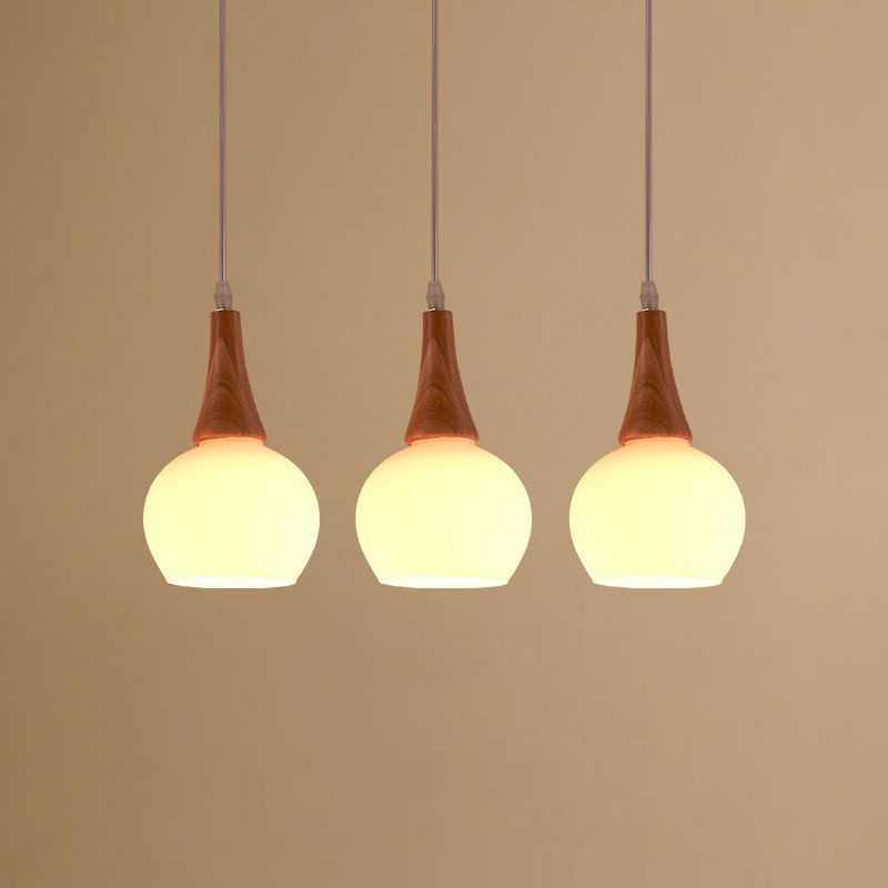 Ideas contemporáneas de iluminación de la isla de la isla geométrica de isla geométrica en marrón