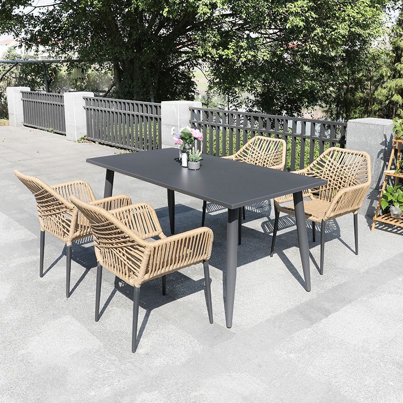 Tropical Outdoor Bistro Chairs with Arms in Faux Rattan and Metal Base