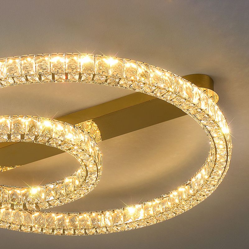 Moderne, runde Deckenleuchte aus Kristallglas in Gold für das Wohnzimmer