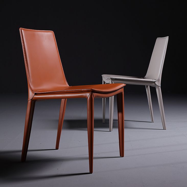 Silla de comedor sin brazos de cuero moderna Silla de comedor de metal para uso doméstico
