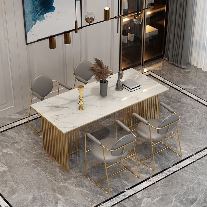 Mesa de comedor de lujo tradicional Mesa de piedra sinterizada con marco de oro para uso en el hogar