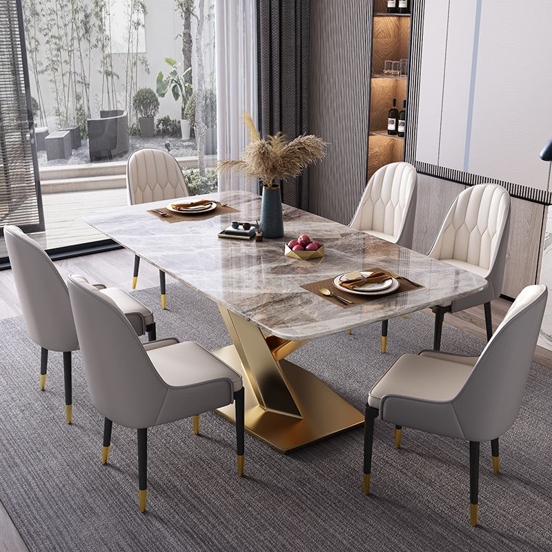 Mesa rectangular de lujo tradicional, mesa de piedra sinterizada gris con base de pedestal dorado