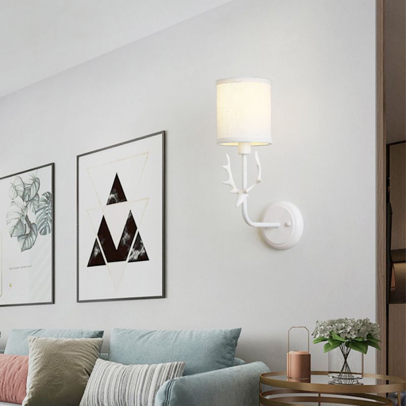 Rustic Cylinder Sconce Lamp 1 Bulb Resin and Fabric Wall Mounted Light in Black/White with Antler Decoration