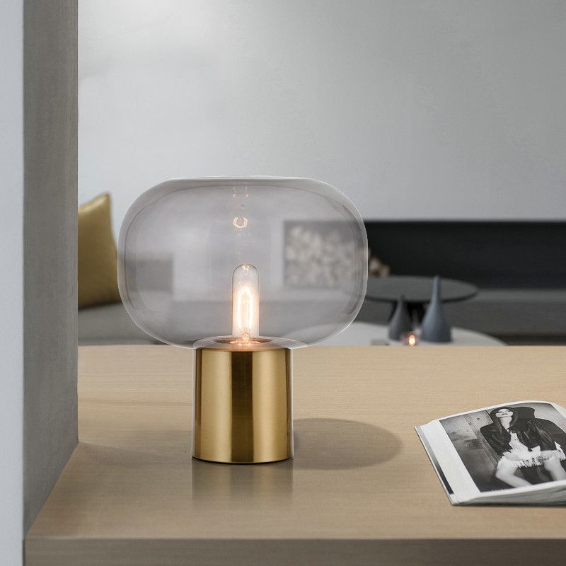 Lampada da comodino minimalista a 1 lampadina Illuminazione da tavolo ovale in metallo dorato con paralume in vetro grigio fumo