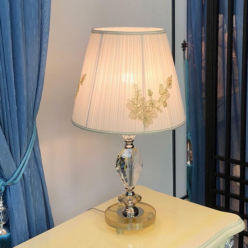 Lámpara de lectura simple en forma de rombo Cristal transparente 1 mesa de noche de cabeza en blanco con sombra de tela cónica