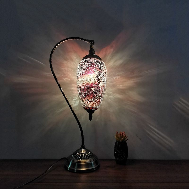 Lámpara de mesa de luz única, luz de vidrio elíptico de vidrio elíptico en bronce con brazo curvo