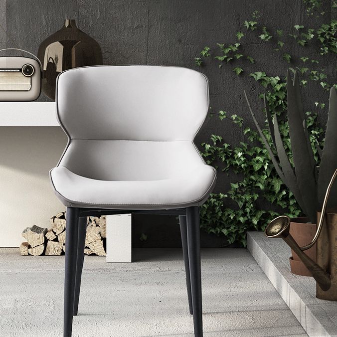 Silla de comedor tapizada de metal con respaldo de alas para interiores industriales (juego de 2)