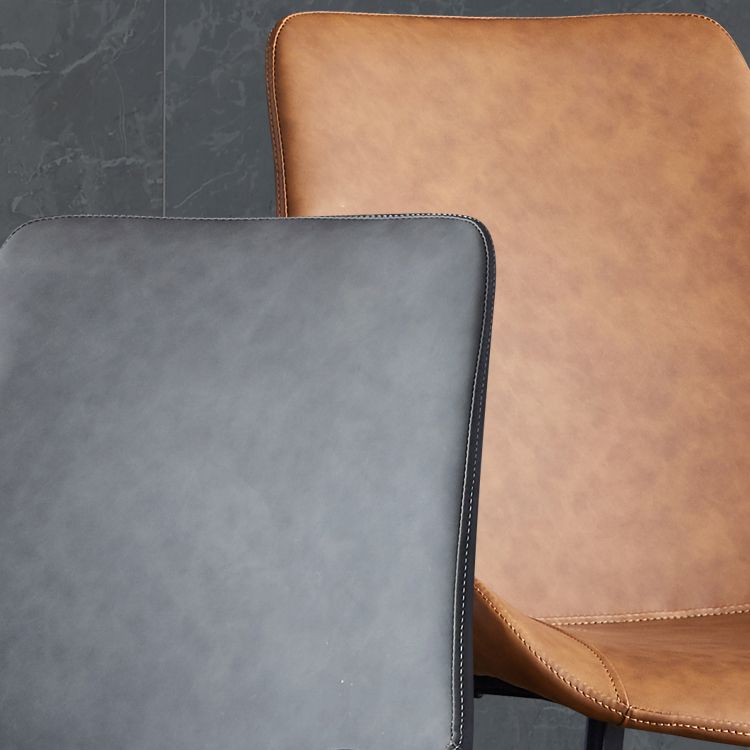 Silla lateral de cuero contemporánea para restaurante Silla de comedor con respaldo sólido