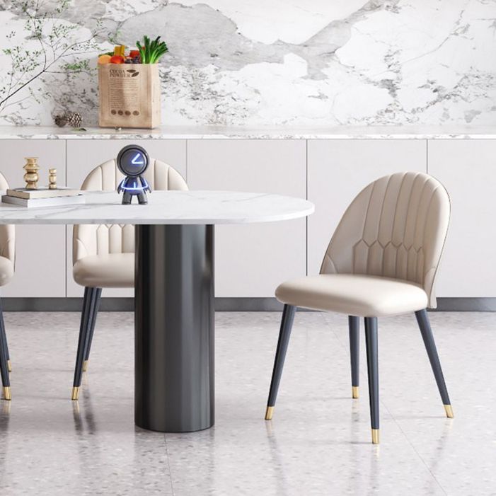 Mesa de comedor Simplicity de 3 patas en tono blanco de piedra sinterizada para comedor