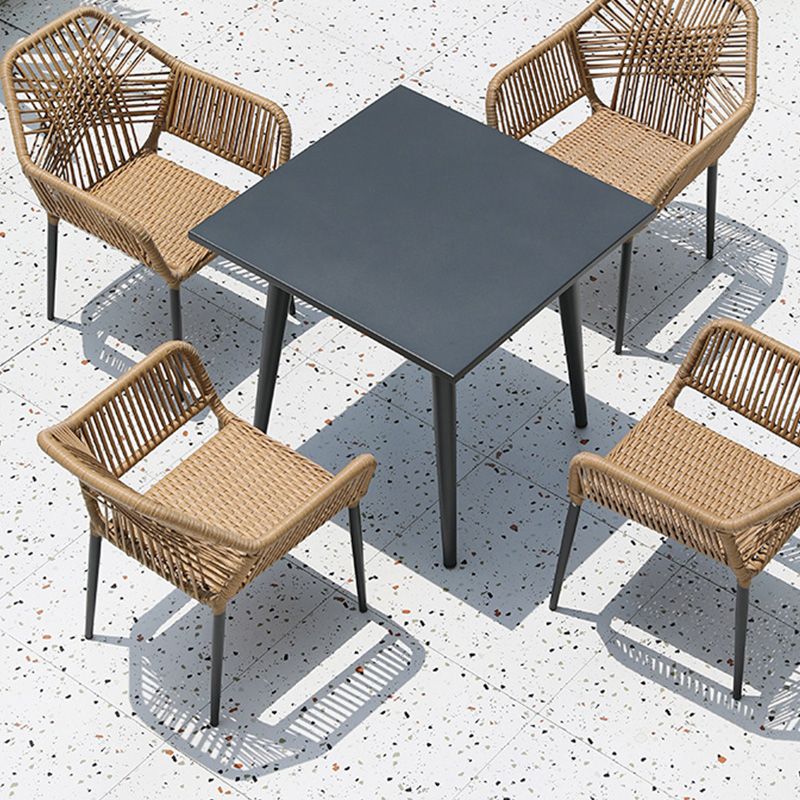 Tropical Outdoor Bistro Stacking Chairs with Arms in Faux Rattan