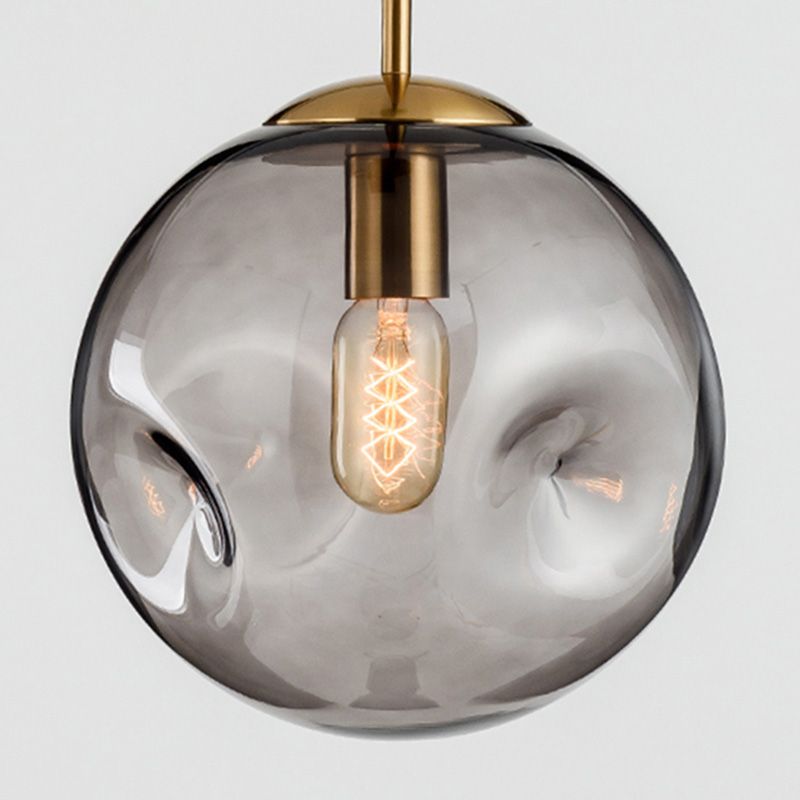 1 pendentif en forme de globe léger avec une nuance en verre fermée