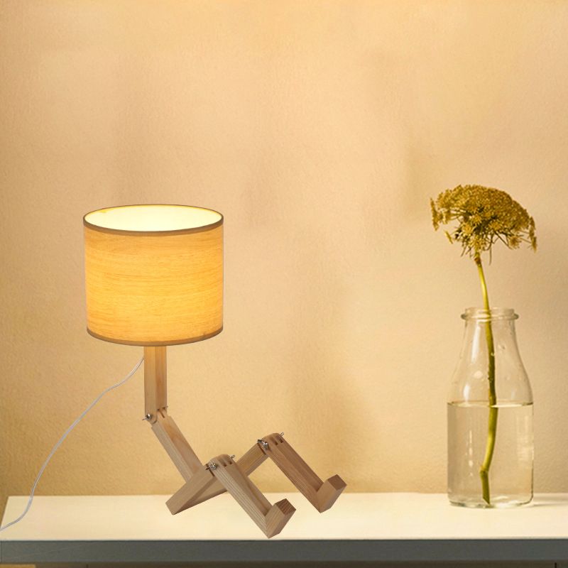 Man-Shaped Table Lamp Novelty Modern Wood Single Beige/Black/White Night Light with Book Rack Design and Cylinder Fabric Shade
