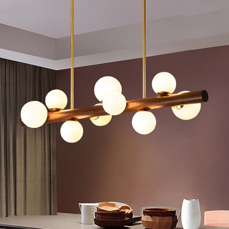 Luces colgantes de restaurantes de múltiples cabezas de madera moderna con sombra de vidrio de globo