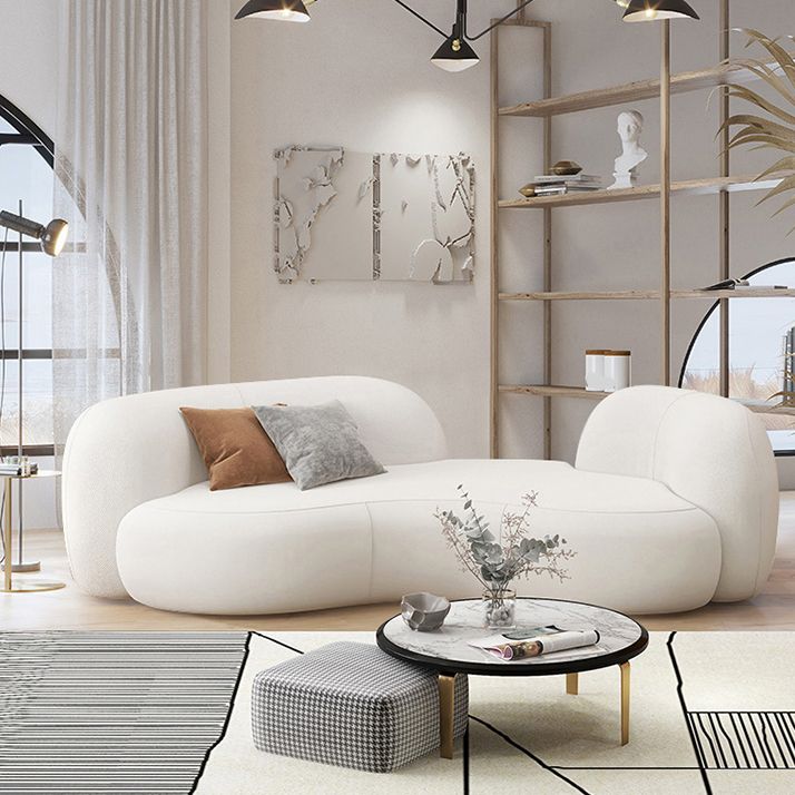 Ultra-Modern Beige Curved Sofa with Tuxedo Arm for Living Room