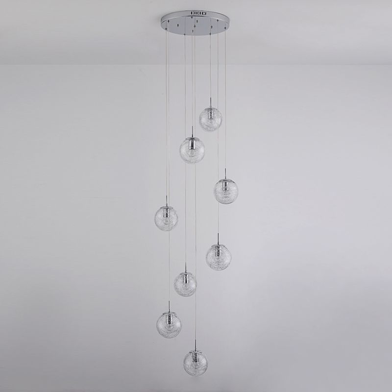 Lumière suspendue en argent dans la lampe suspendue du globe en acier inoxydable de style de luxe moderne pour les escaliers