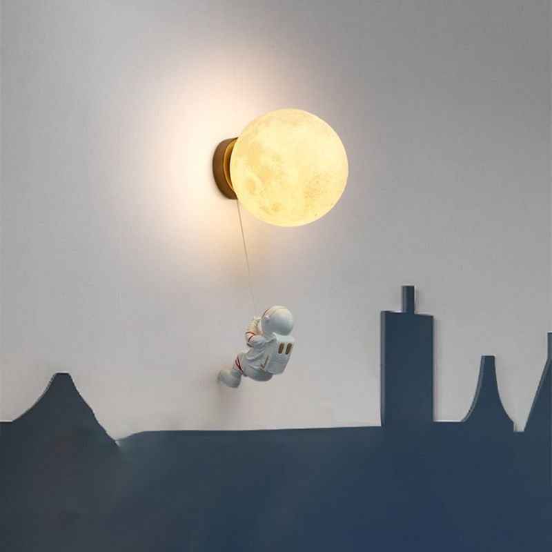 Lampada da parete astronauta e piante