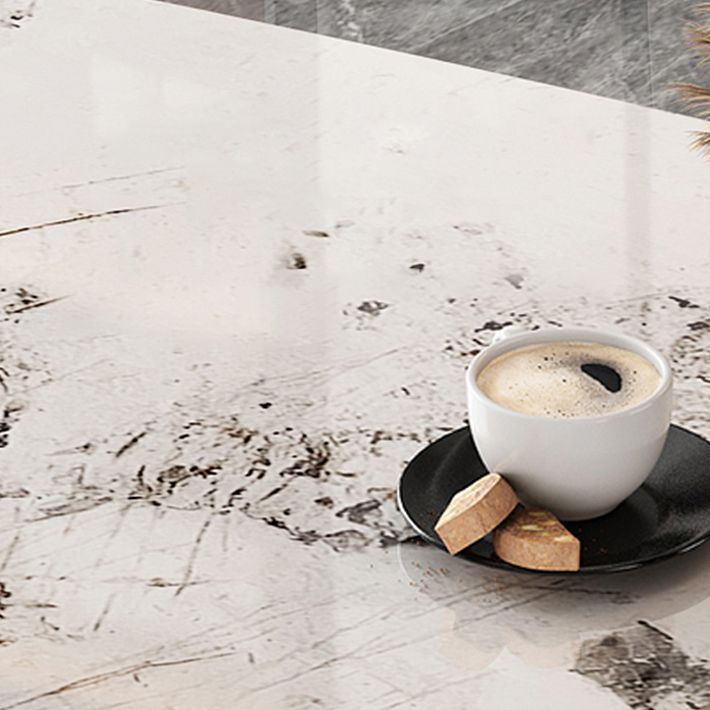 Mesa de comedor de piedra sinterizada de lujo con metal y piedra doble pedestal en oro