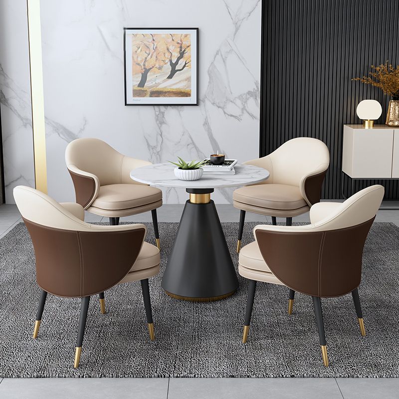 Eigentijdse stenen eettafel rond voetstuk huis keuken dinermeubilair